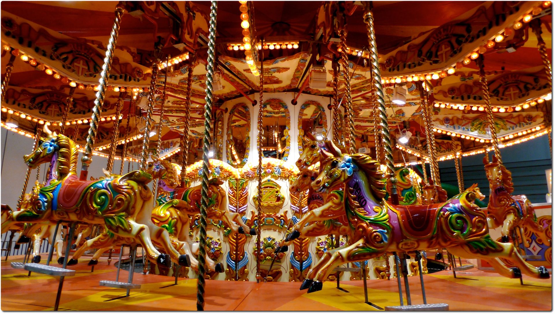 Image of a horse carousel https://cdn-images-1.medium.com/max/7800/1*OfniTBae22oCGP5ZrXObrw.jpeg